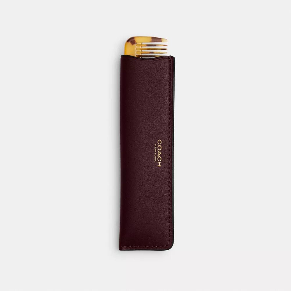 Kam med etui