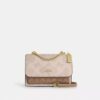 Klare crossbody-taske i blokmønstret Signature Canvas