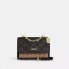 Klare crossbody-taske i blokmønstret Signature Canvas