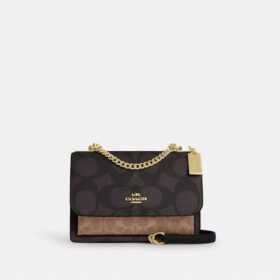 Klare crossbody-taske i blokmønstret Signature Canvas