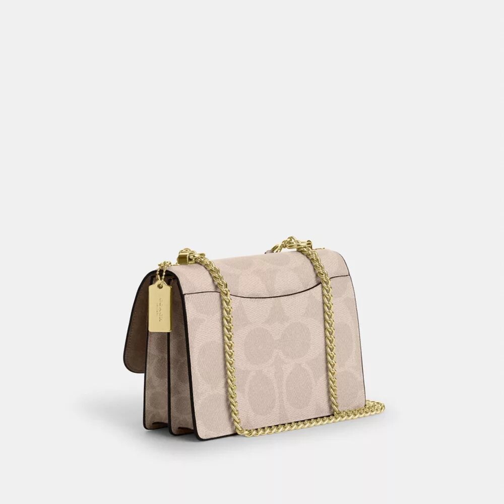 Klare crossbody-taske i blokmønstret Signature Canvas