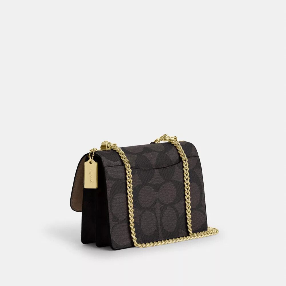 Klare crossbody-taske i blokmønstret Signature Canvas