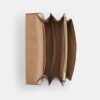 Klare crossbody-taske i blokmønstret Signature Canvas