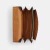 Klare crossbody-taske i blokmønstret Signature Canvas