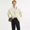 Klare crossbody-taske i blokmønstret Signature Canvas