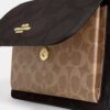 Klare crossbody-taske i blokmønstret Signature Canvas