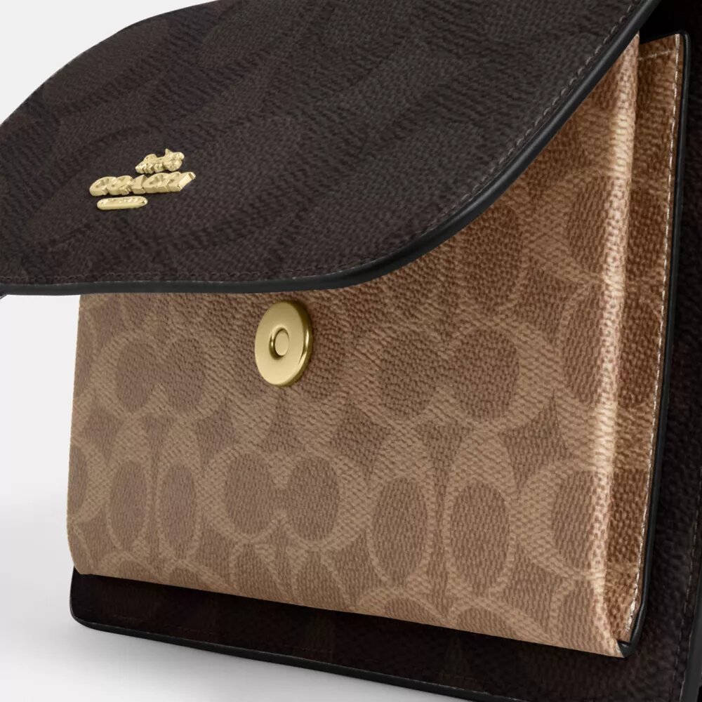 Klare crossbody-taske i blokmønstret Signature Canvas