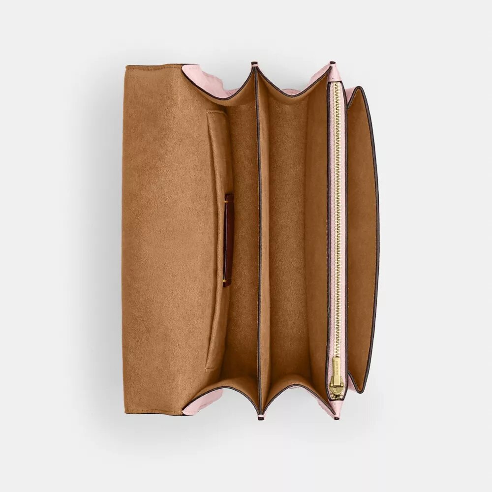 Klare crossbody-taske i Signature Canvas med vedhæng