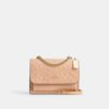 Klare crossbody-taske i signaturlæder