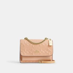 Klare crossbody-taske i signaturlæder