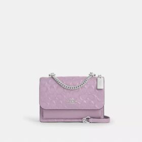 Klare crossbody-taske i signaturlæder