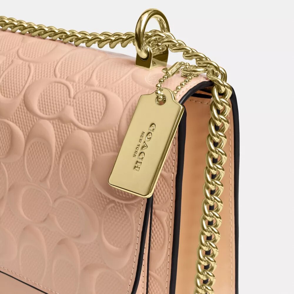 Klare crossbody-taske i signaturlæder