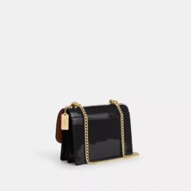 Klare crossbody-taske i signaturlæder