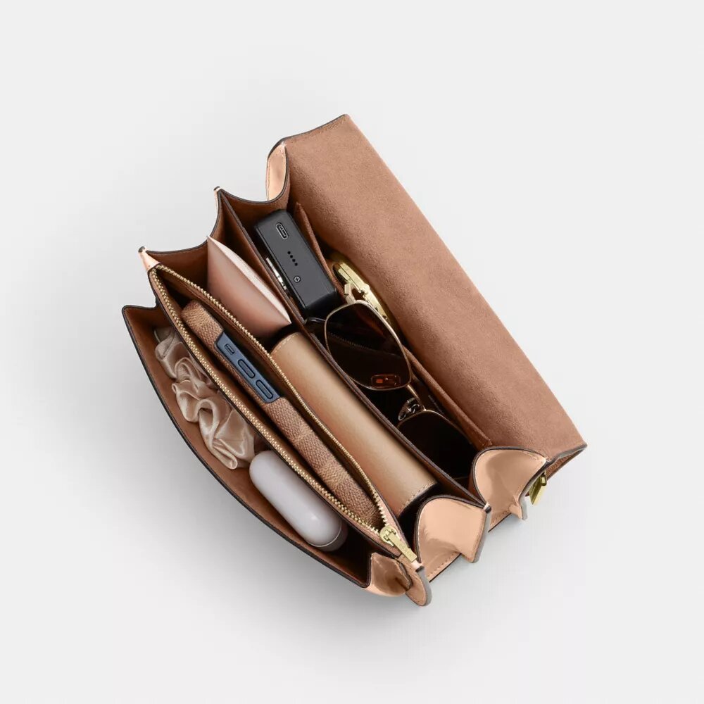 Klare crossbody-taske i signaturlæder