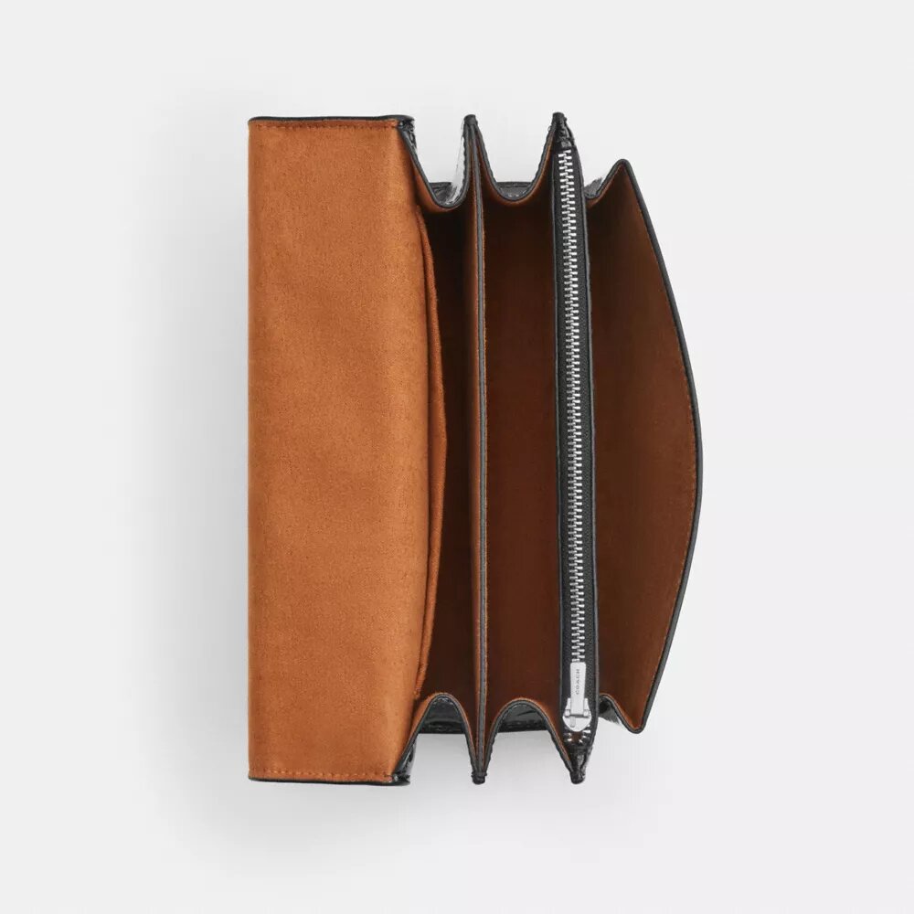 Klare crossbody-taske i signaturlæder