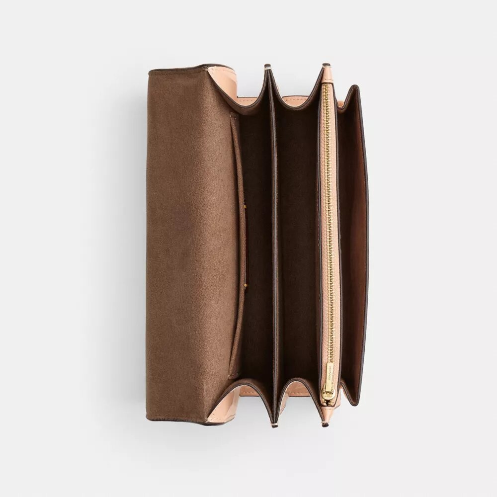 Klare crossbody-taske i signaturlæder
