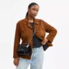 Klare crossbody-taske i signaturlæder