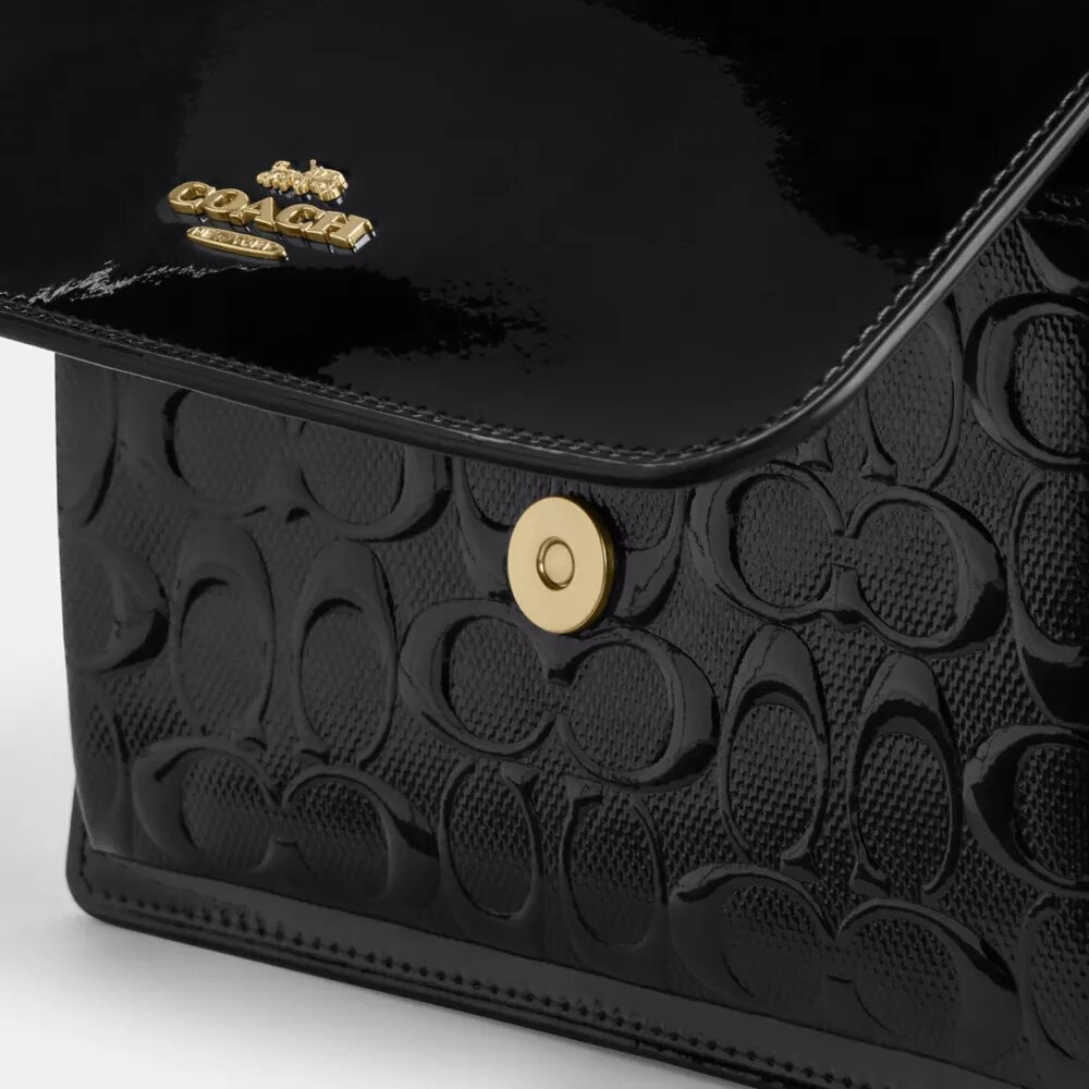 Klare crossbody-taske i signaturlæder