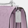 Klare crossbody-taske i signaturlæder