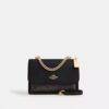 Klare crossbody-tasker i Signature Canvas
