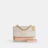Klare crossbody-tasker i Signature Canvas