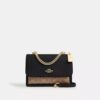 Klare crossbody-tasker i Signature Canvas