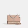Klare crossbody-tasker i Signature Canvas