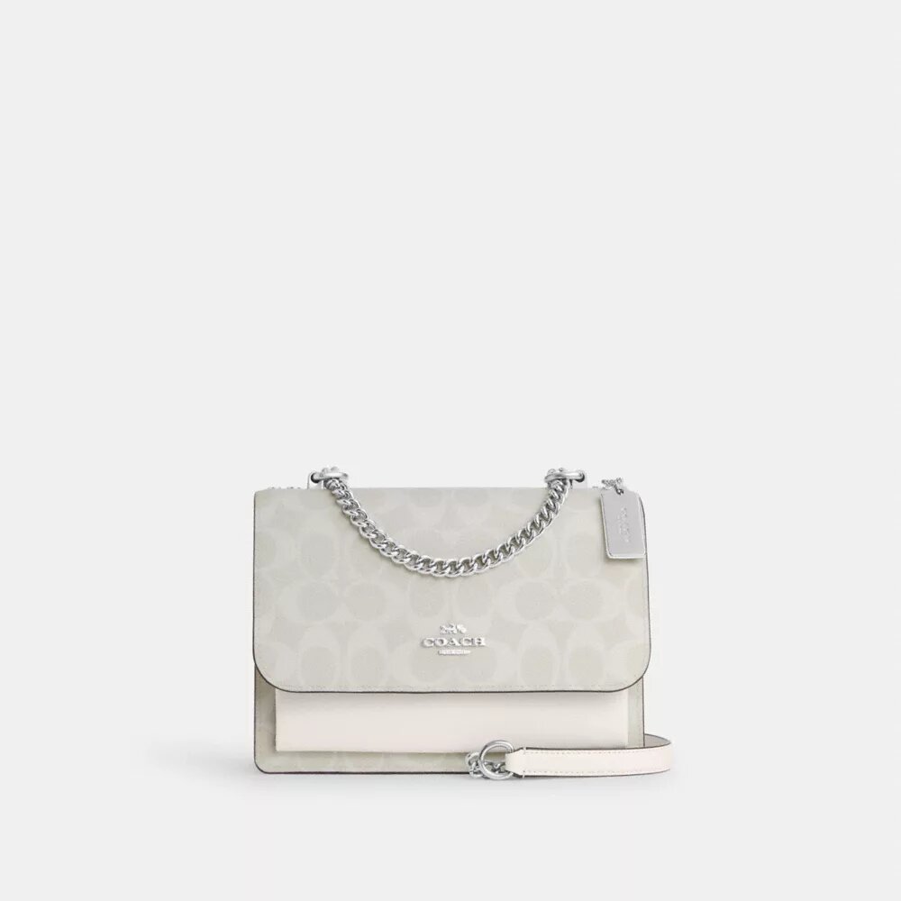 Klare crossbody-tasker i Signature Canvas