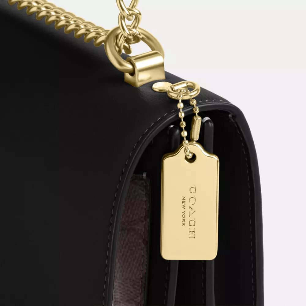 Klare crossbody-tasker i Signature Canvas