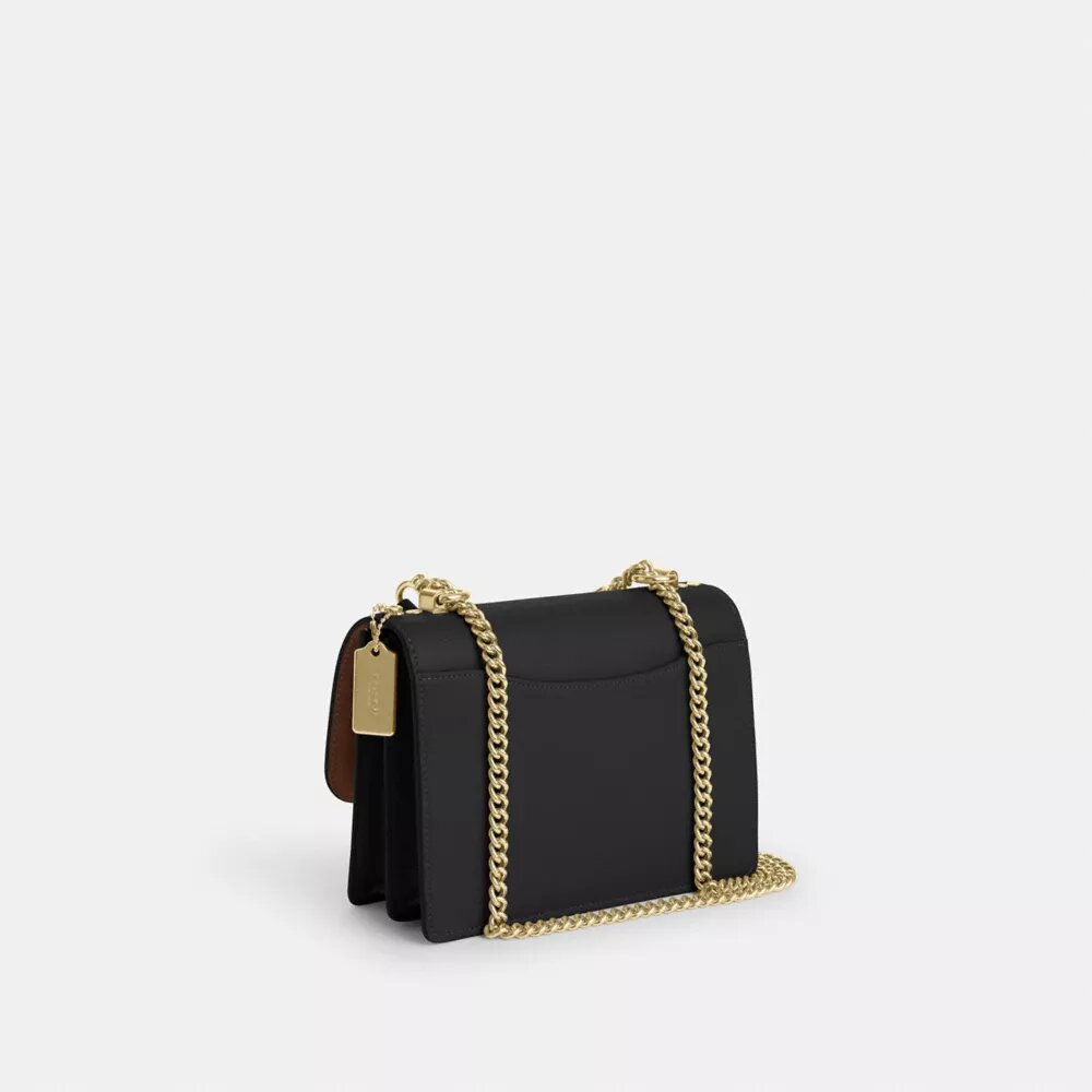 Klare crossbody-tasker i Signature Canvas