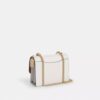 Klare crossbody-tasker i Signature Canvas