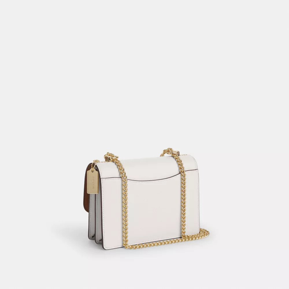 Klare crossbody-tasker i Signature Canvas