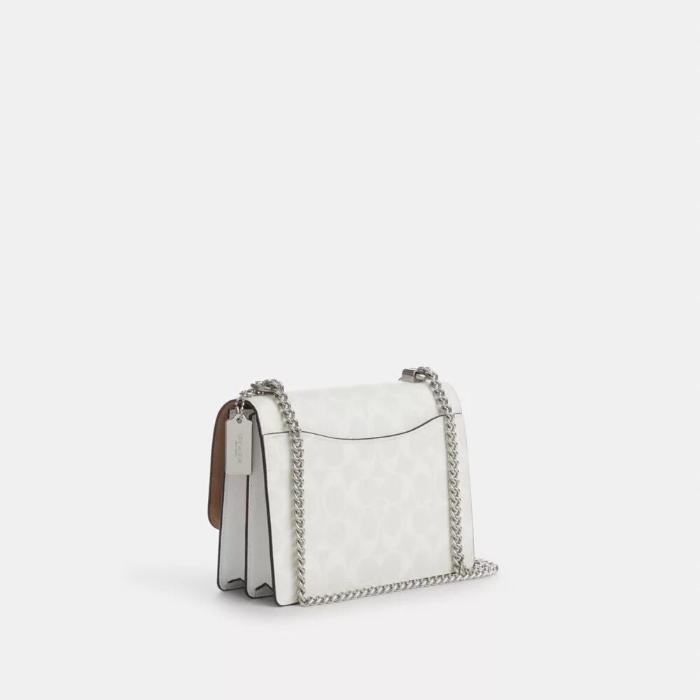 Klare crossbody-tasker i Signature Canvas