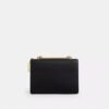 Klare crossbody-tasker i Signature Canvas