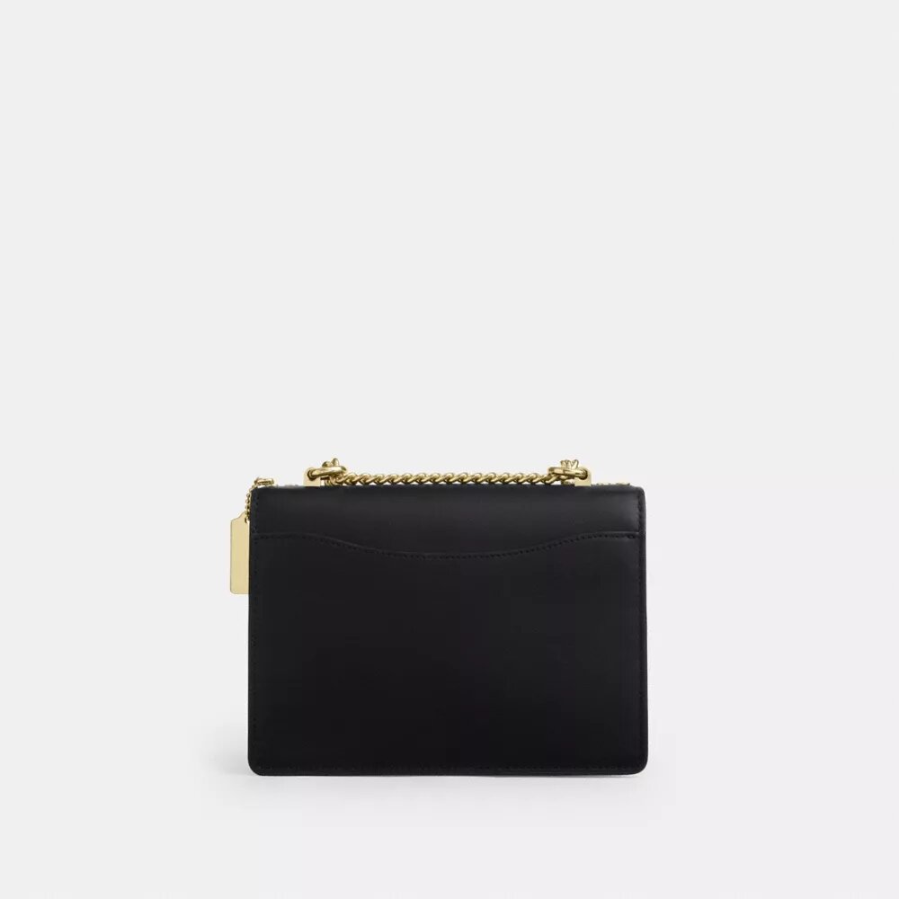 Klare crossbody-tasker i Signature Canvas