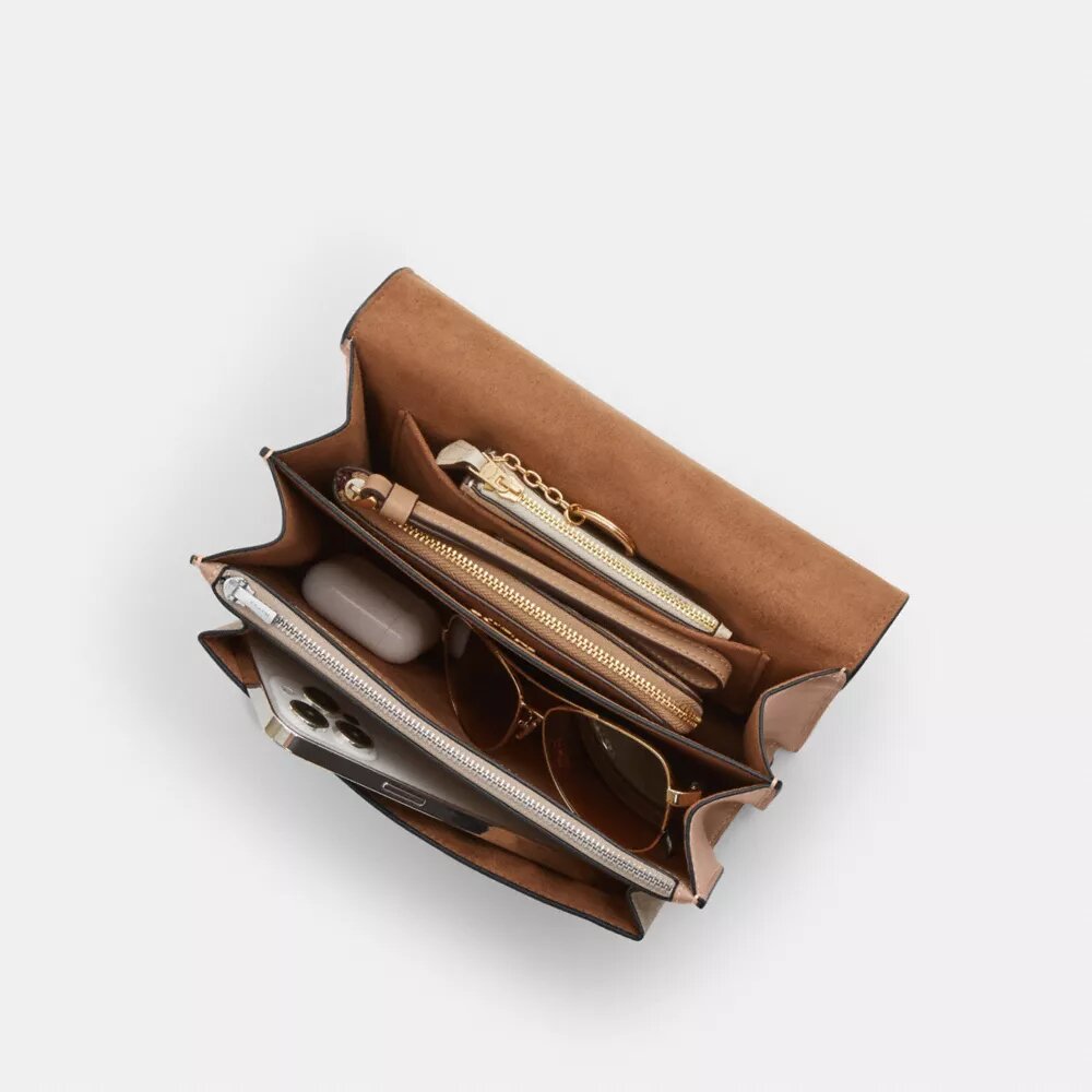Klare crossbody-tasker i Signature Canvas