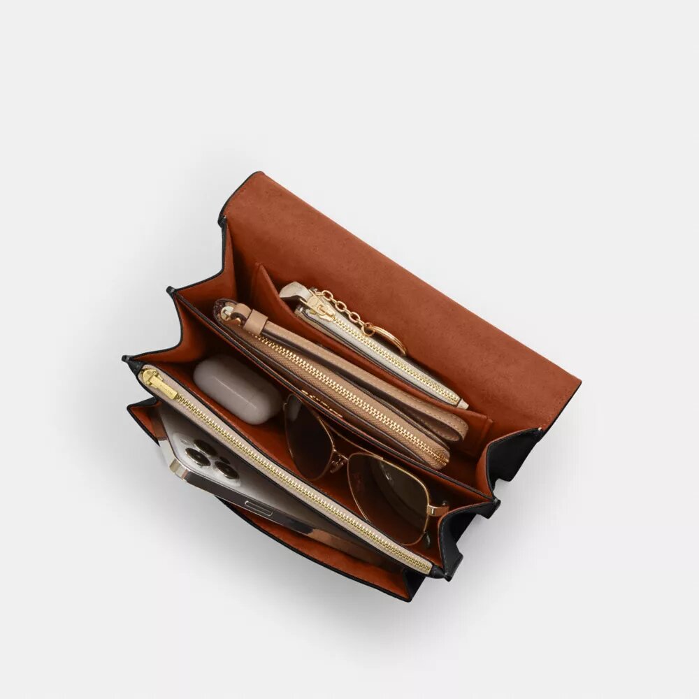 Klare crossbody-tasker i Signature Canvas