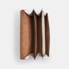 Klare crossbody-tasker i Signature Canvas