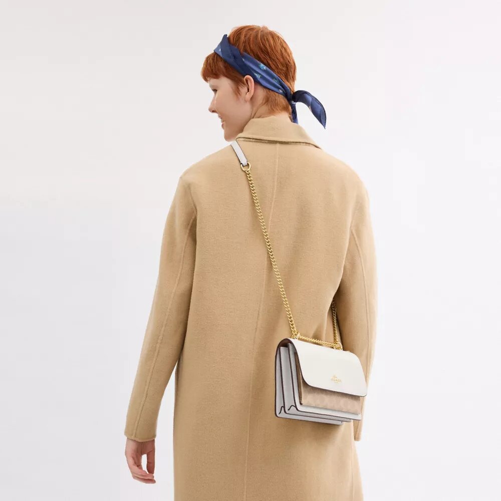 Klare crossbody-tasker i Signature Canvas