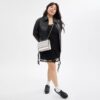 Klare crossbody-tasker i Signature Canvas