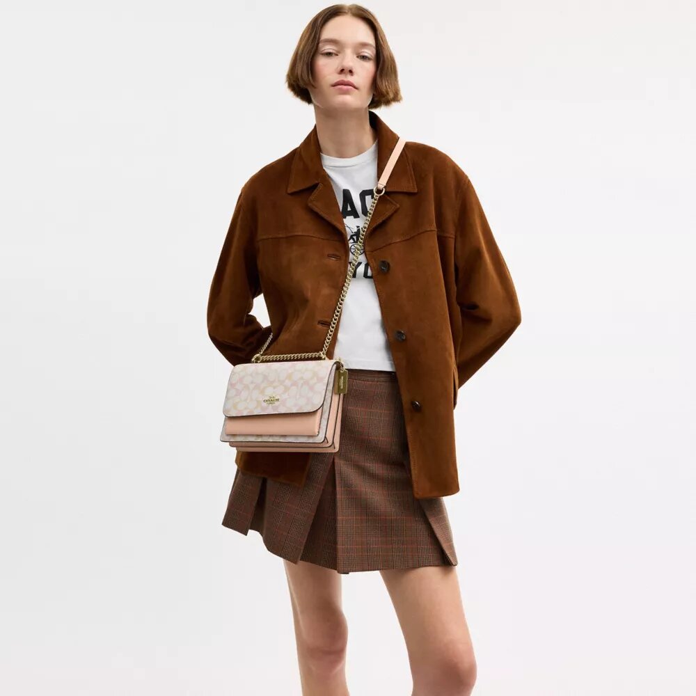 Klare crossbody-tasker i Signature Canvas