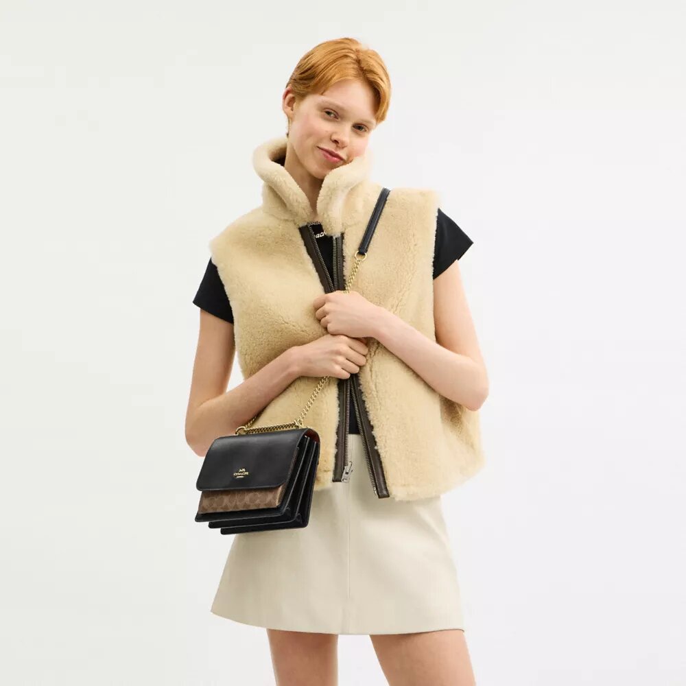Klare crossbody-tasker i Signature Canvas