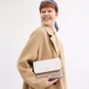 Klare crossbody-tasker i Signature Canvas
