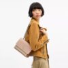 Klare crossbody-tasker i Signature Canvas