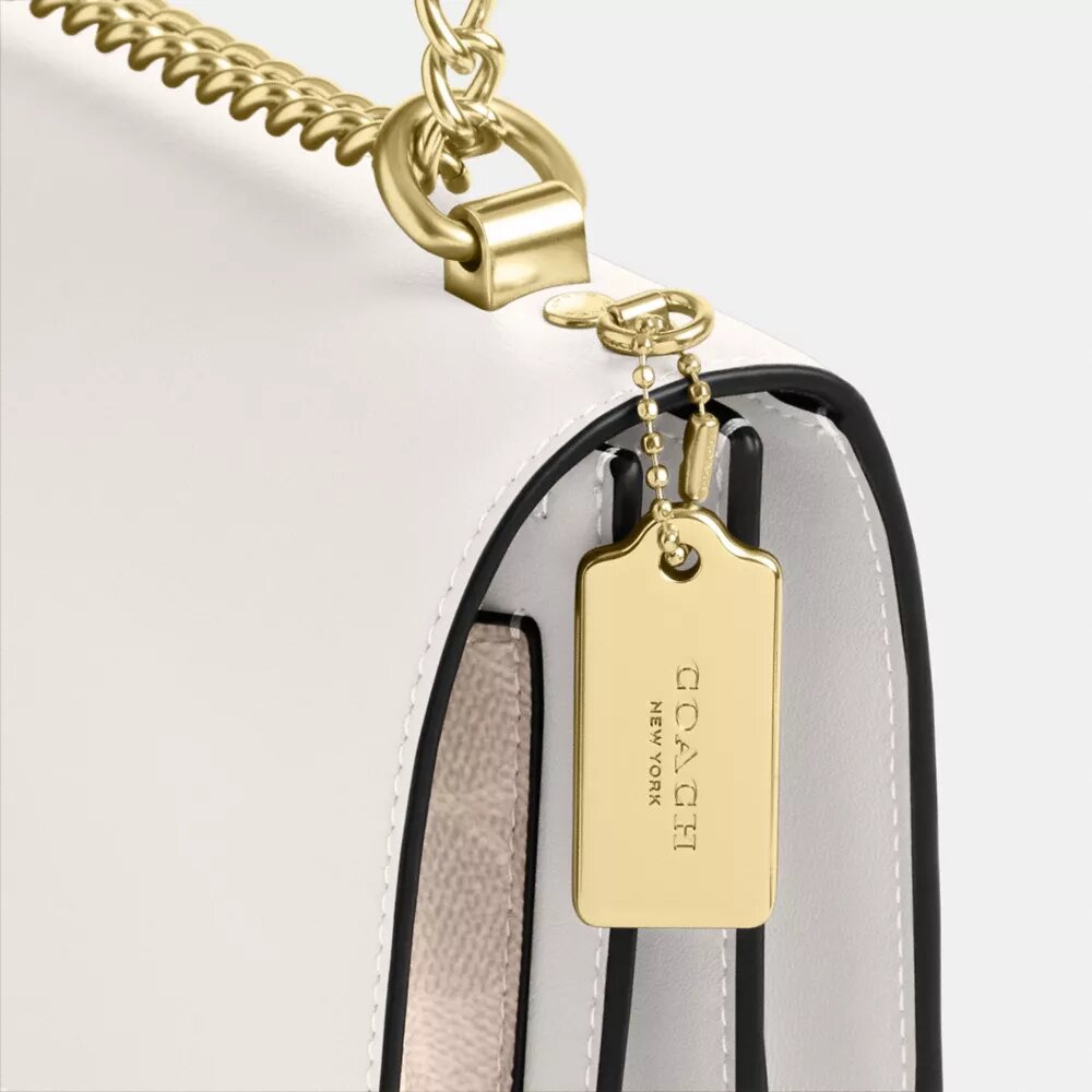 Klare crossbody-tasker i Signature Canvas