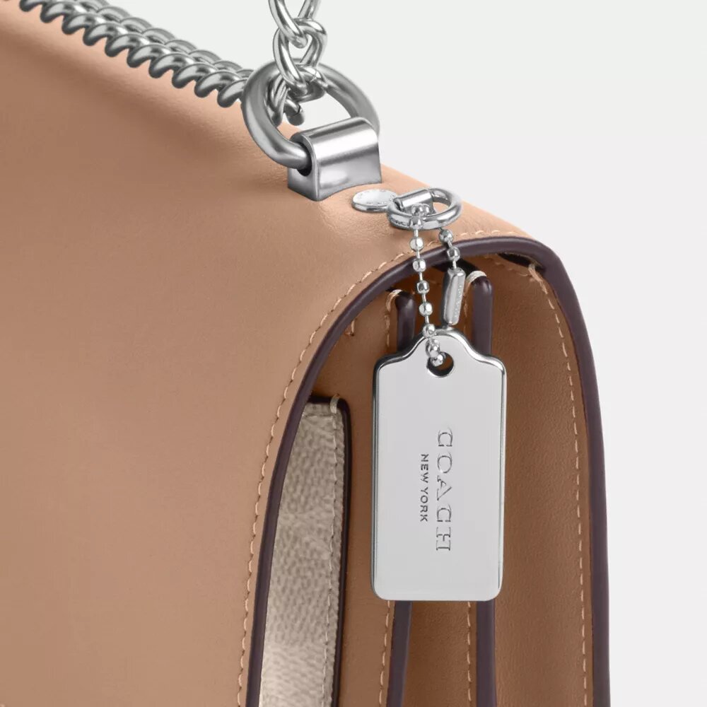 Klare crossbody-tasker i Signature Canvas