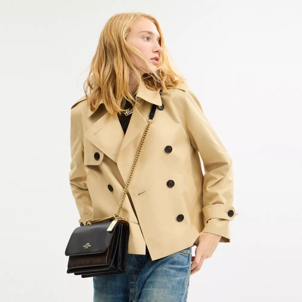 Klare crossbody-tasker i Signature Canvas