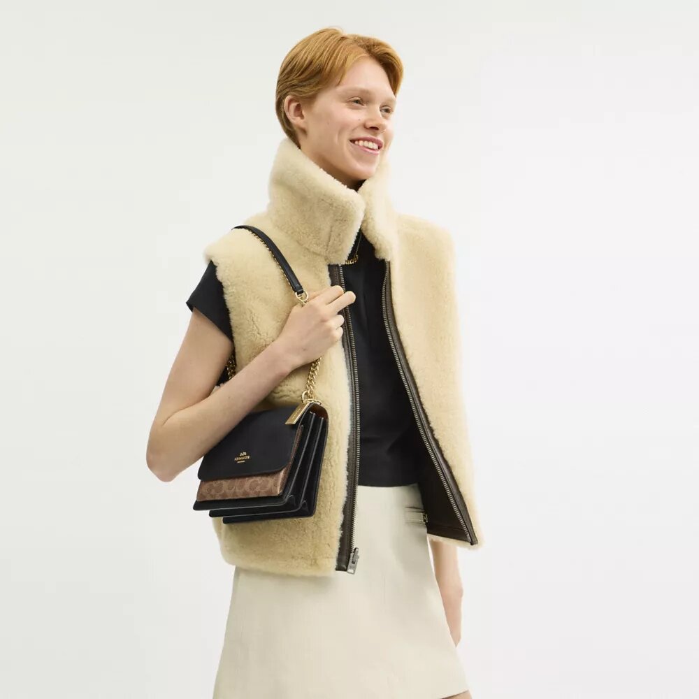 Klare crossbody-tasker i Signature Canvas