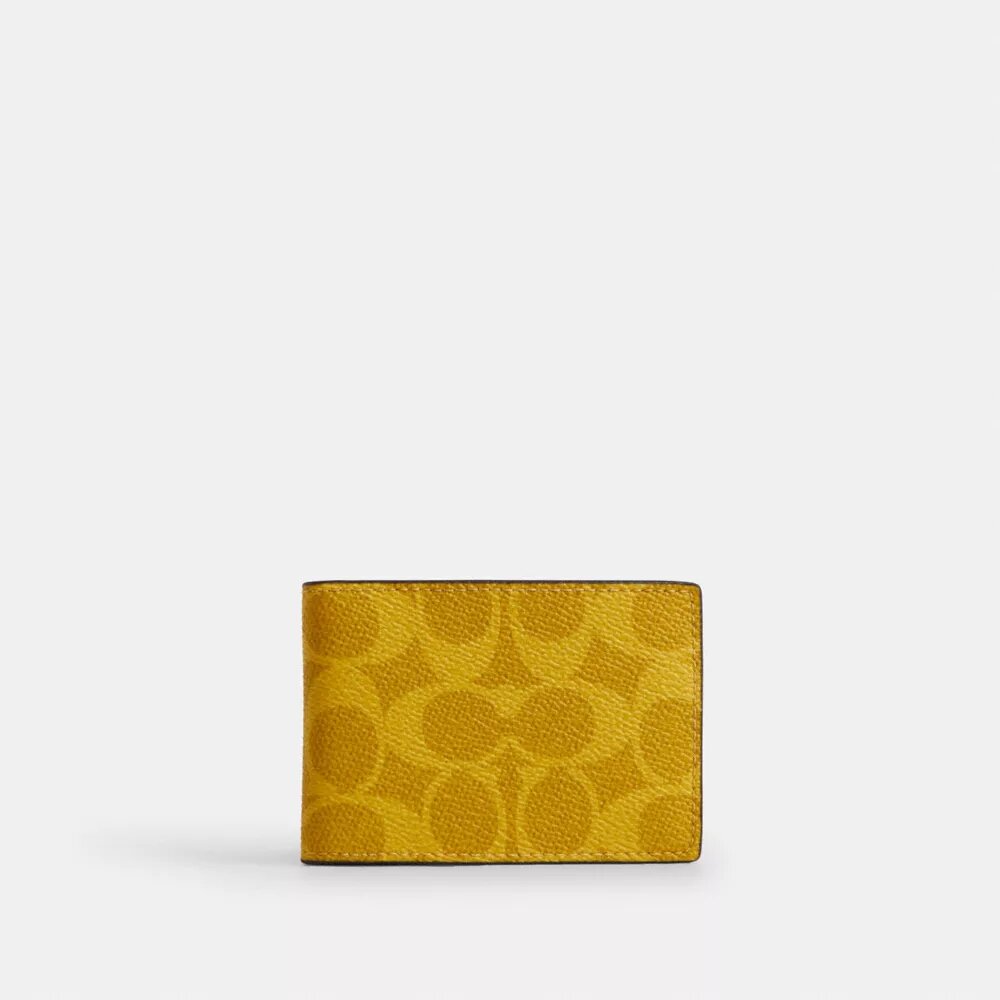 Kompakt pung i Signature Canvas