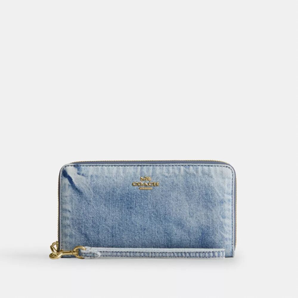 Lang pung med lynlås hele vejen rundt i Loved-denim